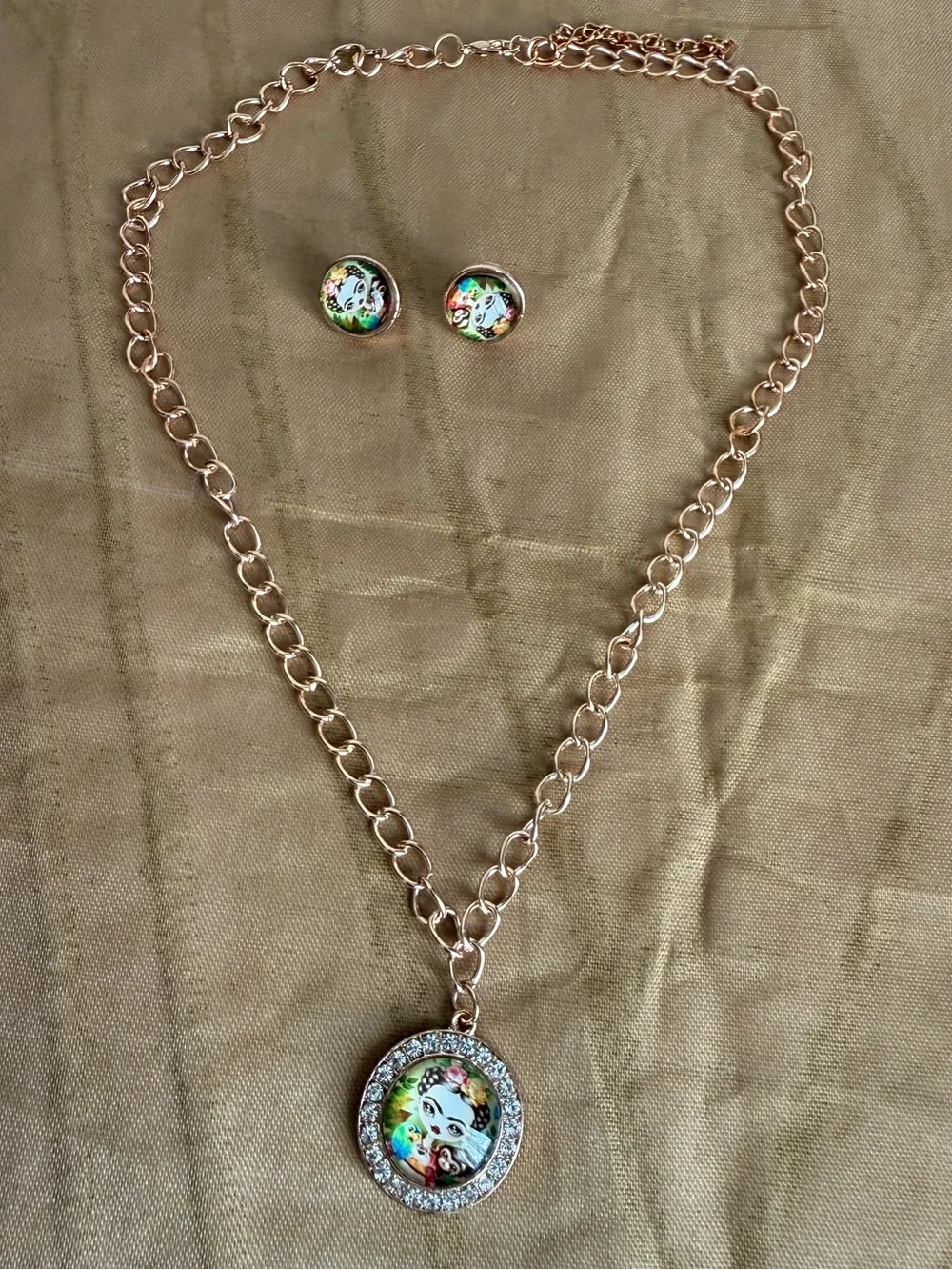 Gold-Tone Floral Portrait Pendant Necklace and Stud Earrings